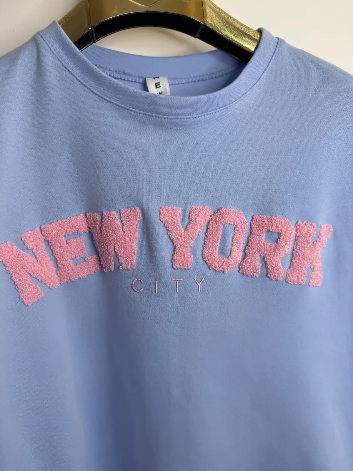 Bluzka błękitna krótki rękaw New York – miniatura 6 z 8