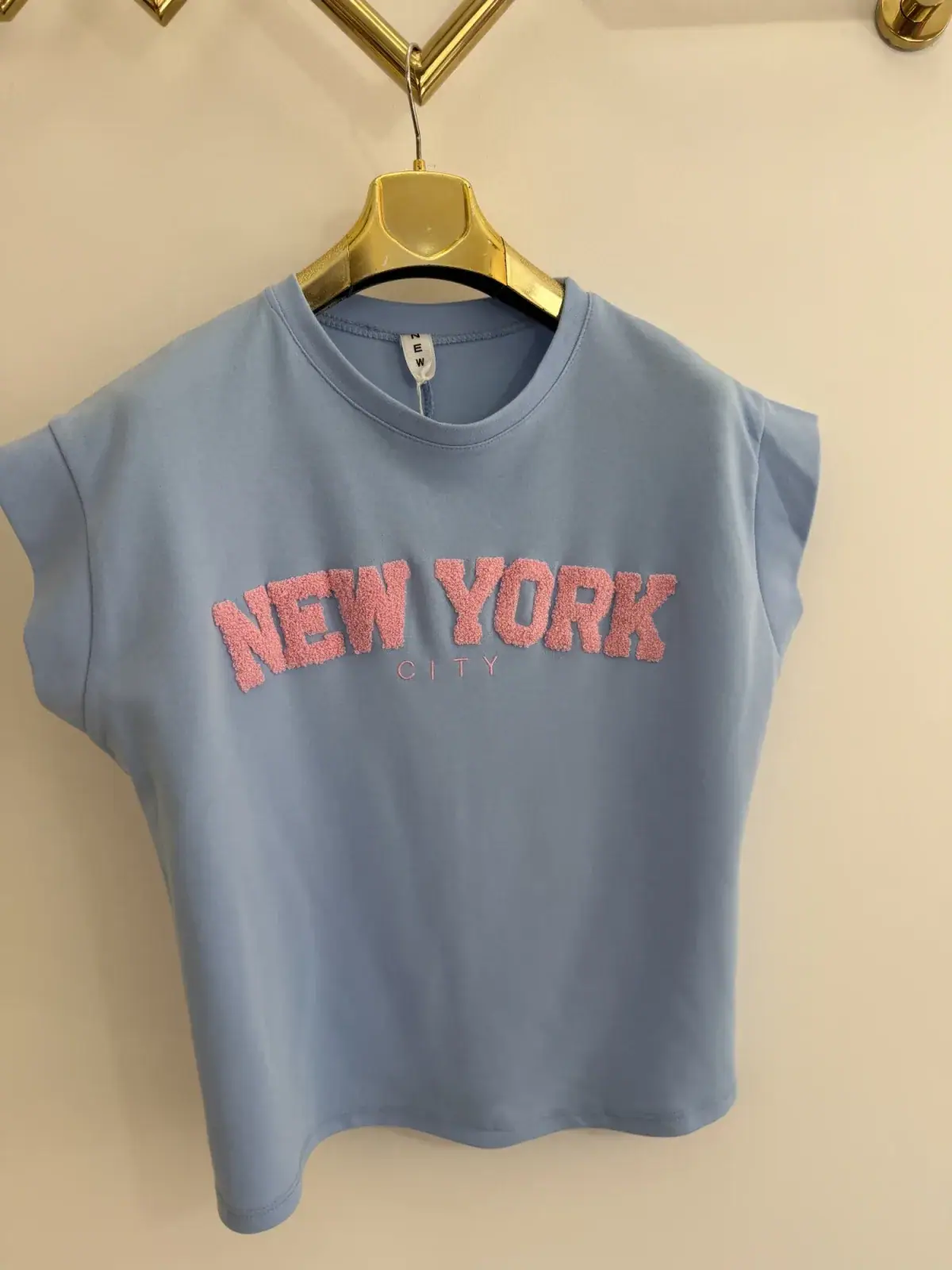Bluzka błękitna krótki rękaw New York – miniatura 7 z 8