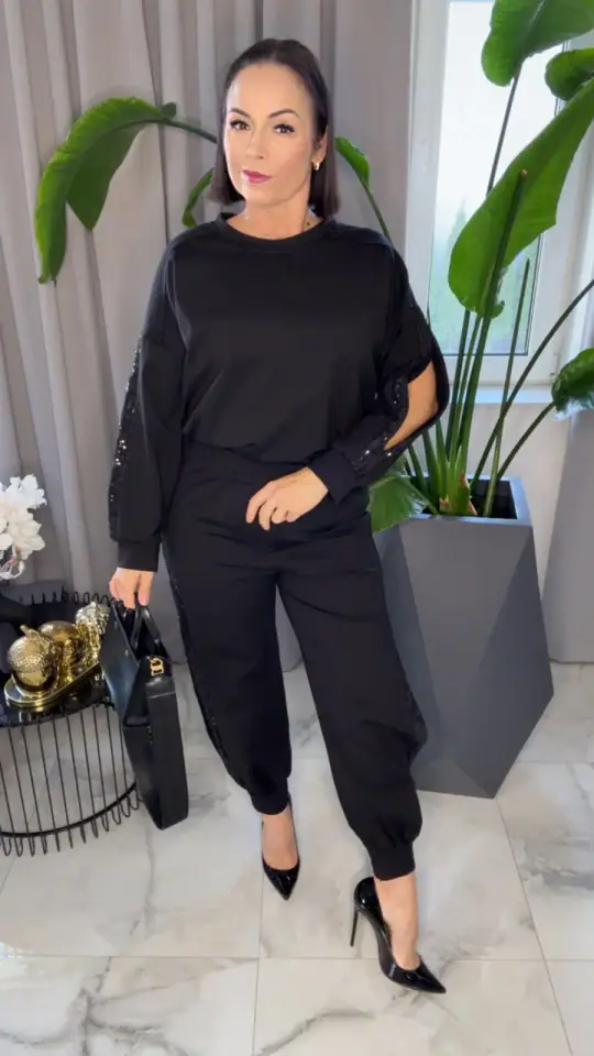 Dres czarny elegancki z rozcięciem piękny, zdjęcie 1 z 2 – odzież damska Victoria Fashion